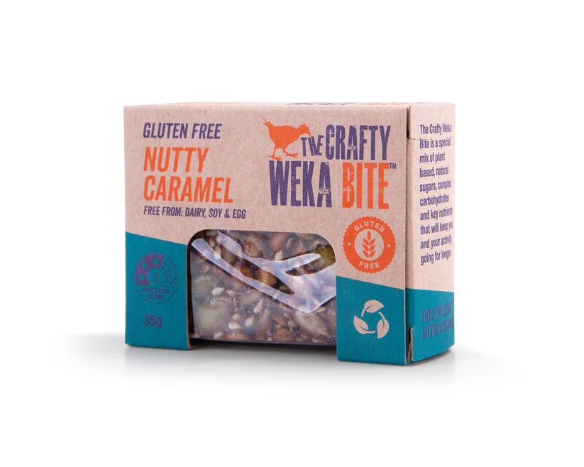 Crafty Weka Nutty Caramel snack bar with crunchy nuts and caramel flavor, displayed in a box on a white background.