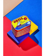 Canned Ortiz sardines in 140g, packed in oil, with visible fish fillets and label on the metal tin.