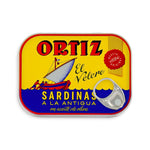 Canned Ortiz sardines in 140g tin, showing shiny sardines packed in oil, ready for cooking or serving