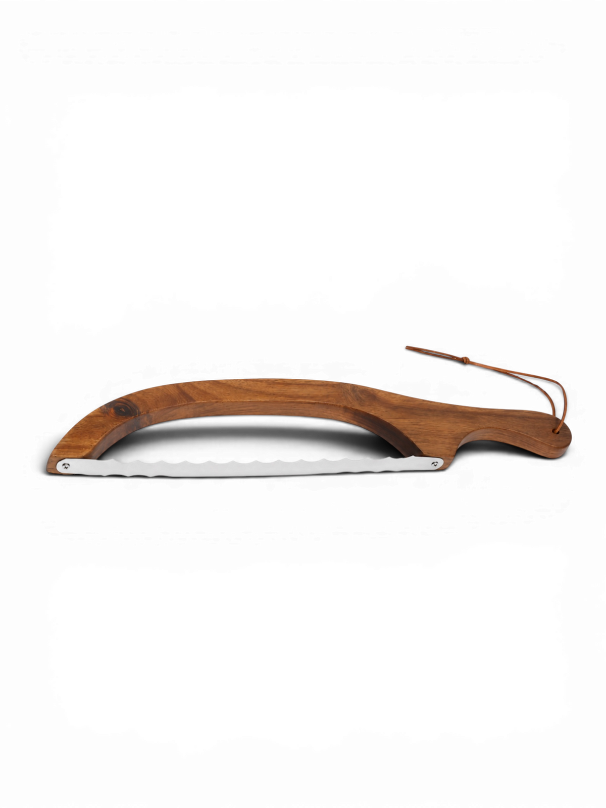 Sourdough Mumma sourdough bread knife with a serrated blade for slicing baked bread, shown on a wooden surface.