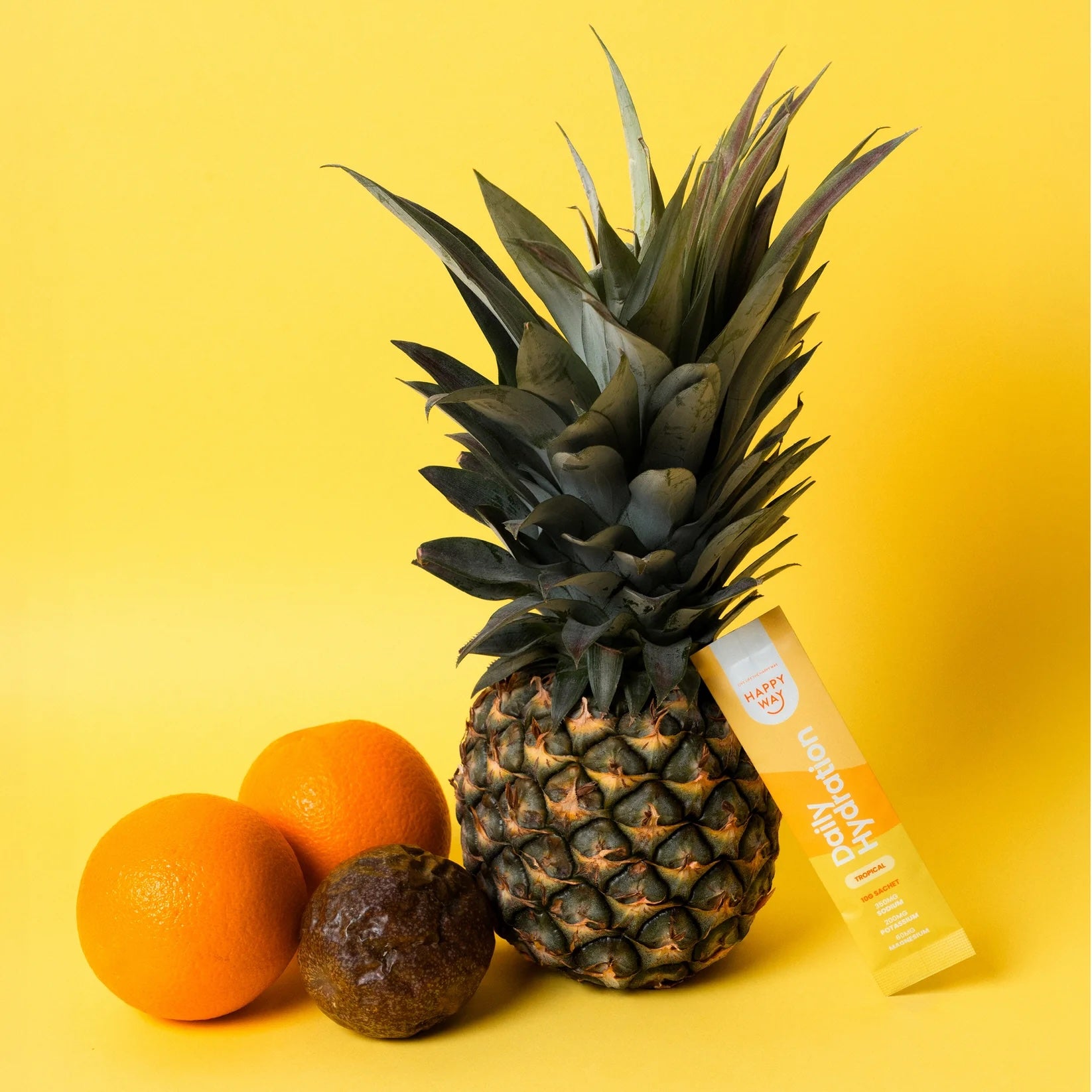 Box of Happy Way Tropical Daily Hydration Sachets, 30 single-serving sports and energy drink packets with tropical flavor.